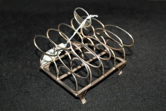 George III five-bar toast rack, with loop handle, crested, London 1802, James Turner & Charles Fox